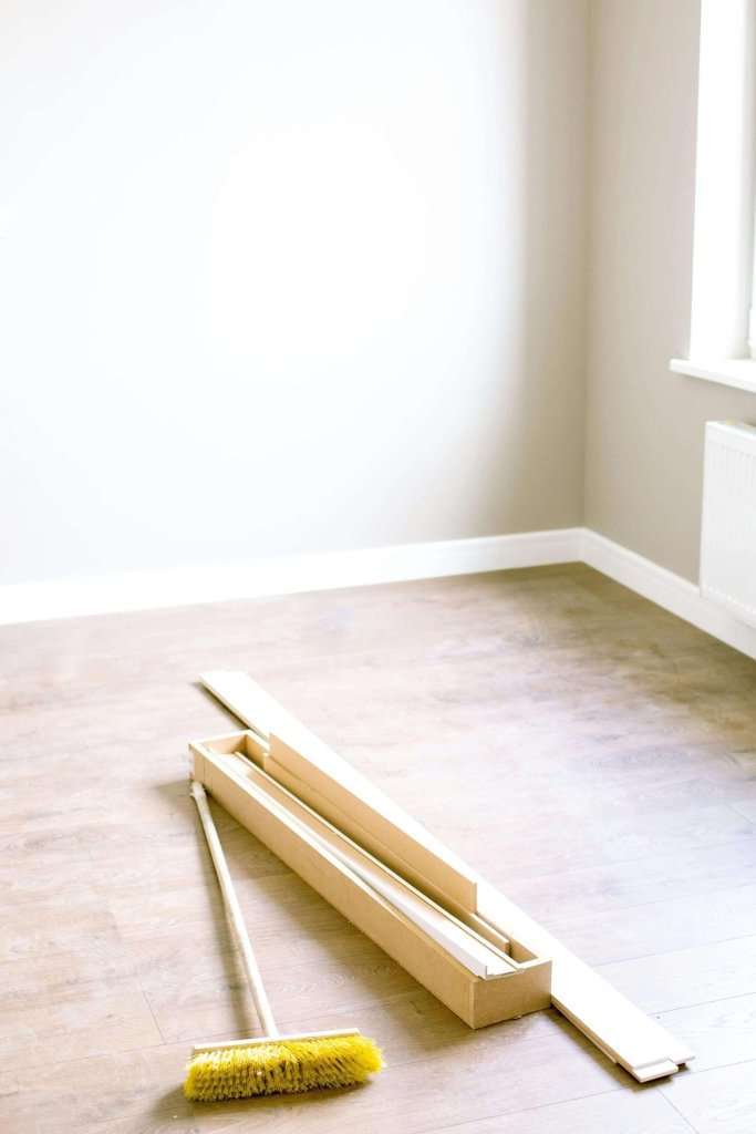 Cleaning professionals deep cleaning a renovated house in Sutton, highlighting the attention to detail and use of eco-friendly cleaning products.